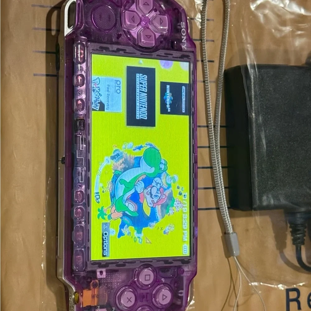 Sony Handheld Console in Transparent Purple